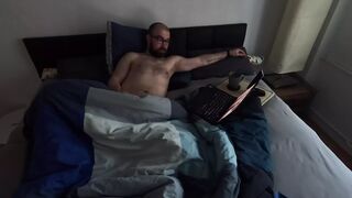 Watching porn in bed