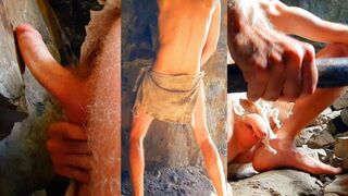 Neanderthal man masturbates dick in a cave near a campfire