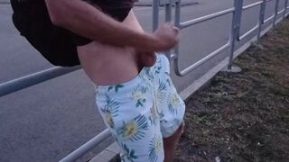 handsome jerking off a dick on the embankment of the plant. EXTREME